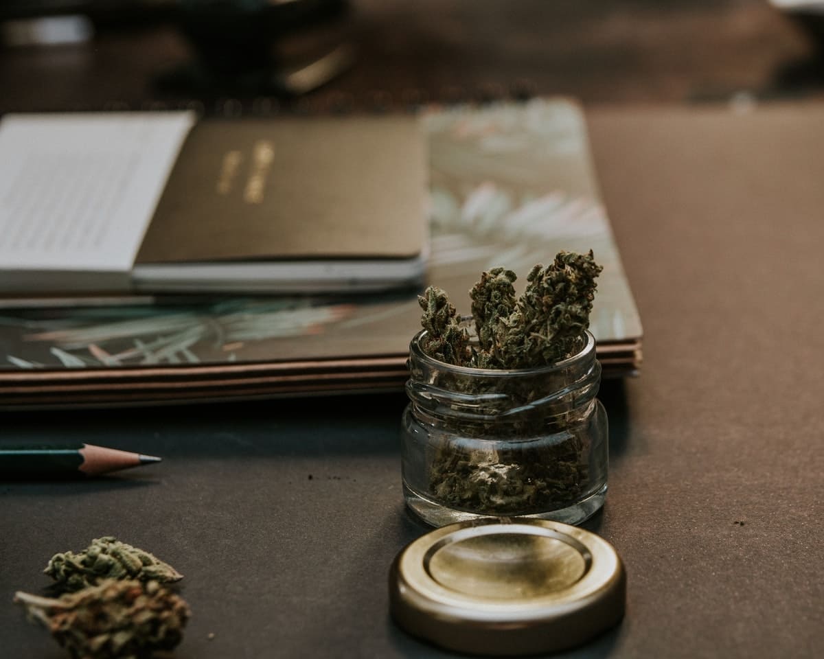 dried kush cannabis on a table
